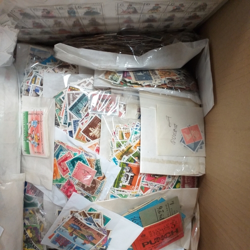 39 - Box containing stamps in packets (all off paper and sorted in to countries) on stock cards, album le... 