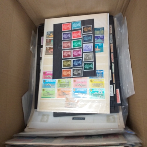 39 - Box containing stamps in packets (all off paper and sorted in to countries) on stock cards, album le... 