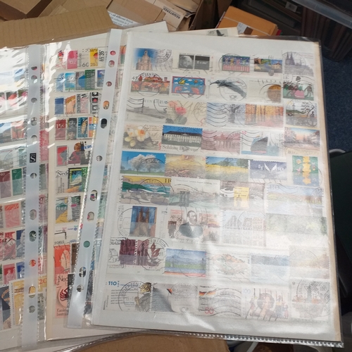 40 - Box containing stamps in packets (all off paper and sorted in to countries) on stock cards, album le... 