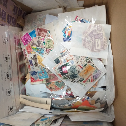 40 - Box containing stamps in packets (all off paper and sorted in to countries) on stock cards, album le... 