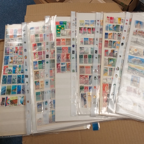 40 - Box containing stamps in packets (all off paper and sorted in to countries) on stock cards, album le... 