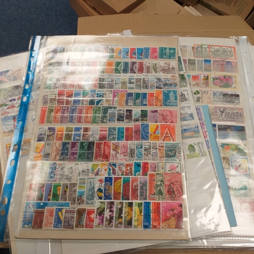 40 - Box containing stamps in packets (all off paper and sorted in to countries) on stock cards, album le... 