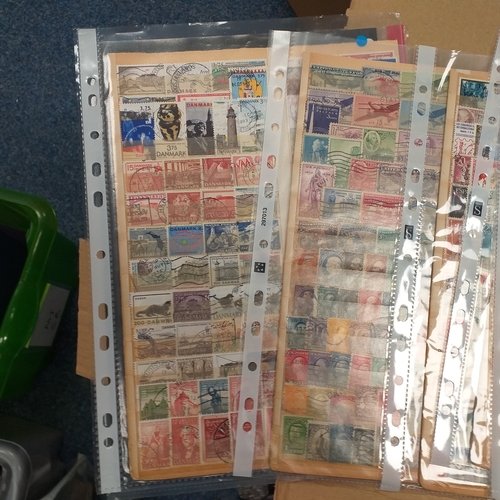 41 - Box containing stamps in packets (all off paper and sorted in to countries) on stock cards, album le... 