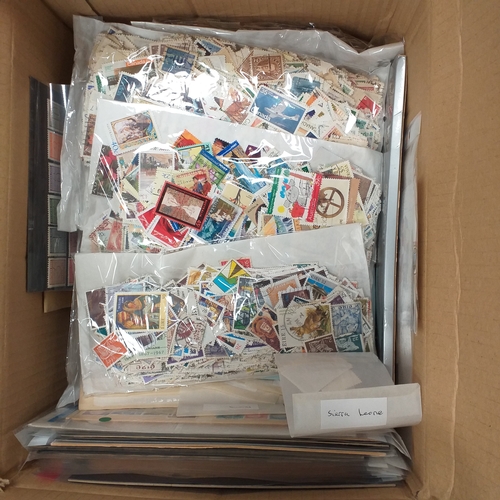 41 - Box containing stamps in packets (all off paper and sorted in to countries) on stock cards, album le... 