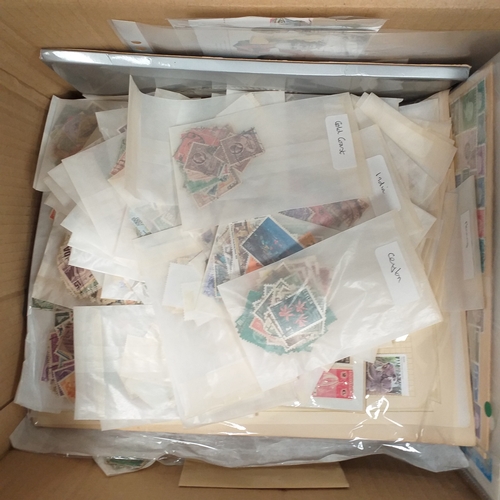 41 - Box containing stamps in packets (all off paper and sorted in to countries) on stock cards, album le... 