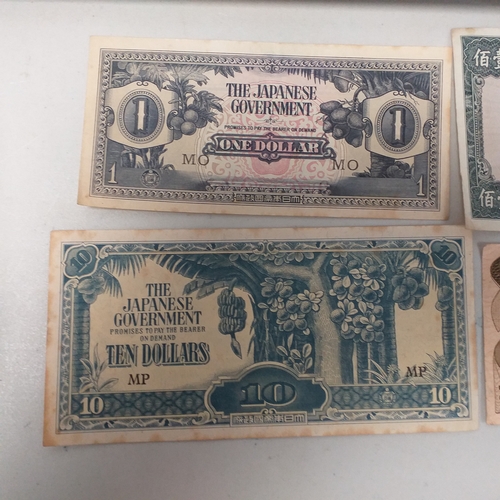 4 - Plastic packet containing 18 bank notes: 7 x GB, 6 x Japanese and also 2 x Singapore. Mostly in good... 