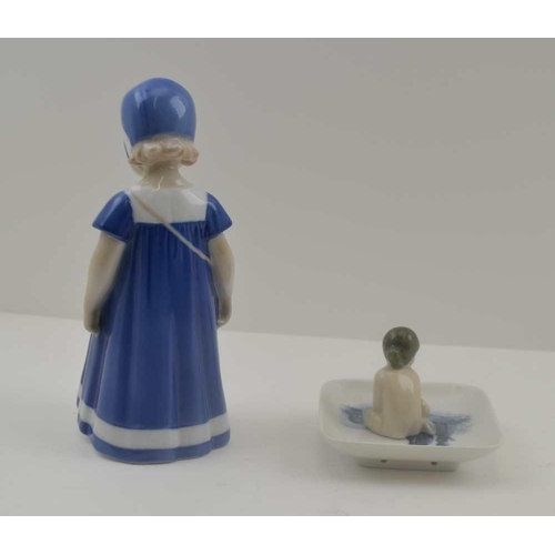 103 - A BING & GRONDAHL DANISH CERAMIC FIGURE OF A GIRL IN A BLUE DRESS & BONNET, factory marks to base in... 