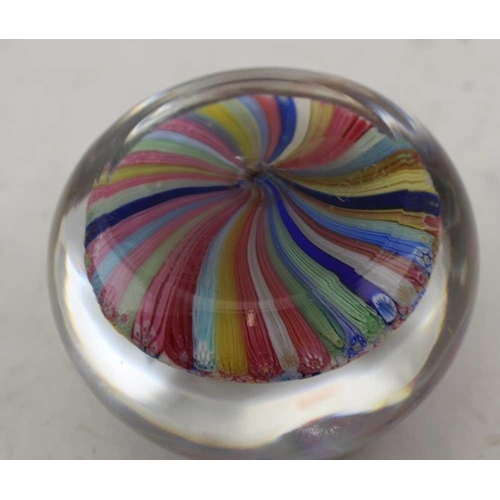 131 - A BACCARAT MILLEFIORI PAPERWEIGHT, limited edition with silhouettes and date set in the cone tops, 1... 