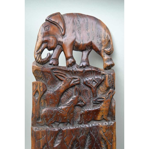 143 - AN EARLY 20TH CENTURY CENTRAL AFRICAN CARVED WOOD BIRTHING STOOL, carved animal decoration, includin... 