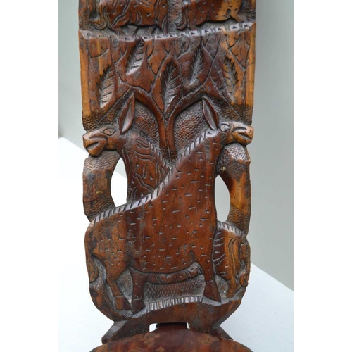 143 - AN EARLY 20TH CENTURY CENTRAL AFRICAN CARVED WOOD BIRTHING STOOL, carved animal decoration, includin... 