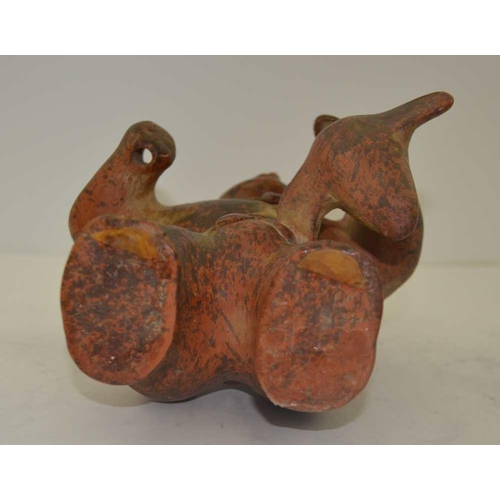 150 - A MOCHE TERRACOTTA VESSEL moulded in the form of a pre-Columbian bird catcher, possibly 17th century... 