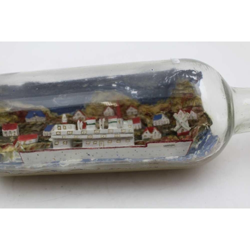 165 - TWO SHIPS IN BOTTLES, polychrome painted, bottles 28cm high 