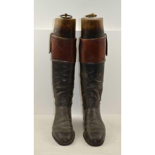 180 - A PAIR OF BLACK LEATHER, TAN TOP HUNTING / RIDING BOOTS with wooden trees 