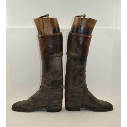 180 - A PAIR OF BLACK LEATHER, TAN TOP HUNTING / RIDING BOOTS with wooden trees 