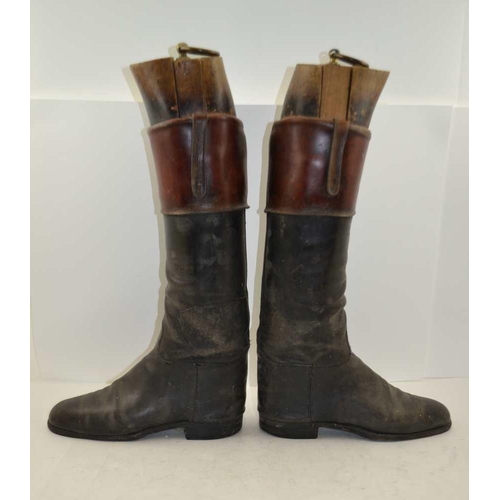 180 - A PAIR OF BLACK LEATHER, TAN TOP HUNTING / RIDING BOOTS with wooden trees 