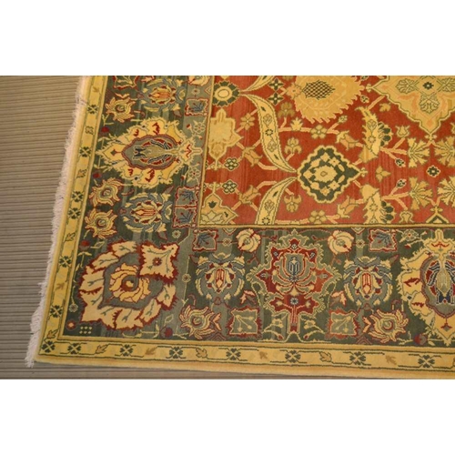 250 - A SPECIALLY COMMISSIONED HAND WOVEN IRANIAN WOOL FLOOR CARPET, in the Donegal palette, of stylised f... 