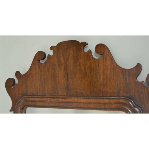 264 - A GEORGIAN DESIGN MAHOGANY FRET FRAME WALL MIRROR, plate size 40cm x 25cm 