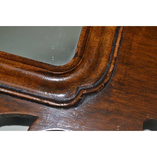 264 - A GEORGIAN DESIGN MAHOGANY FRET FRAME WALL MIRROR, plate size 40cm x 25cm 