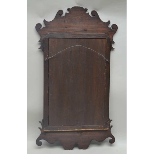 264 - A GEORGIAN DESIGN MAHOGANY FRET FRAME WALL MIRROR, plate size 40cm x 25cm 