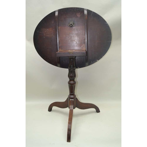 266 - A 19TH CENTURY MAHOGANY SNAP TOP OCCASIONAL TABLE, oval top on carved stem and tripod supports, the ... 