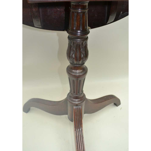 266 - A 19TH CENTURY MAHOGANY SNAP TOP OCCASIONAL TABLE, oval top on carved stem and tripod supports, the ... 