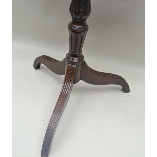 266 - A 19TH CENTURY MAHOGANY SNAP TOP OCCASIONAL TABLE, oval top on carved stem and tripod supports, the ... 