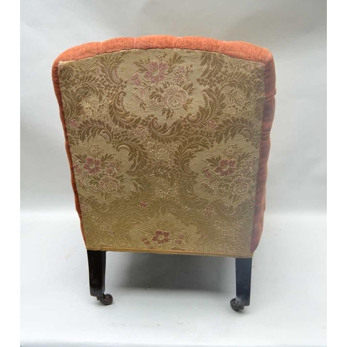 273 - A LATE VICTORIAN UPHOLSTERED NURSING CHAIR raised on turned and fluted fore supports with castors be... 