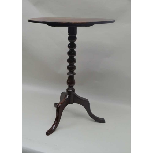 275 - A 19TH CENTURY MAHOGANY SNAP TOP WINE TABLE, on turned stem and tripod supports, oval top 53cm x 38c... 