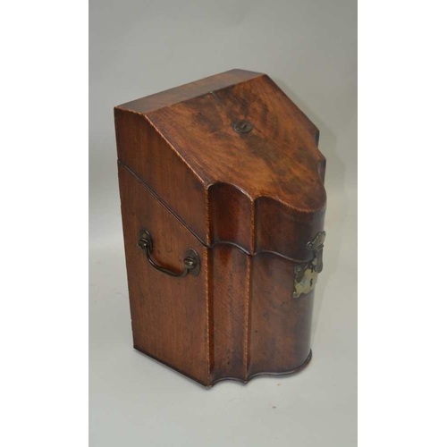 279 - A GEORGE III MAHOGANY KNIFE BOX, serpentine front, fitted brass side handles, the interior converted... 