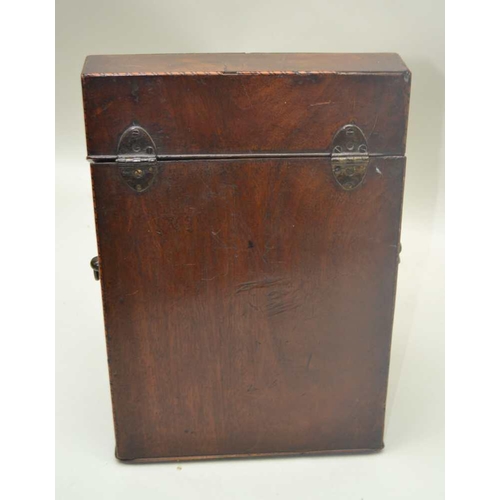 279 - A GEORGE III MAHOGANY KNIFE BOX, serpentine front, fitted brass side handles, the interior converted... 