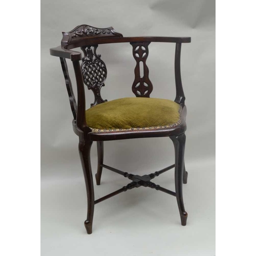 297 - A LATE 19TH / EARLY 20TH CENTURY POSSIBLE CONTINENTAL CORNER ARMCHAIR, with fancy lattice pierced ce... 