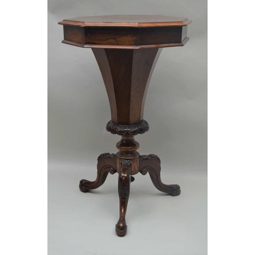 301 - A VICTORIAN INLAID WALNUT OCTAGONAL TOPPED WORK TABLE, having lift-up lid on a tapering faceted colu... 