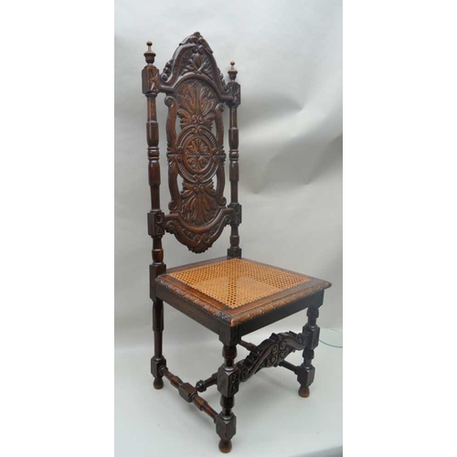 303 - A VICTORIAN OAK JACOBEAN DESIGNED SINGLE CHAIR, having well carved high back, with bergere seat, sup... 