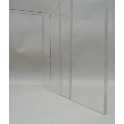 306 - A MODERNIST NEST OF THREE PERSPEX TABLES the tallest 40cm high 