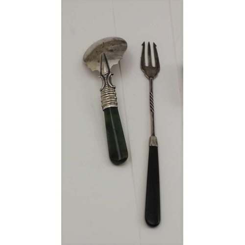 51 - A STERLING SILVER PICKLE FORK AND A SPOON, both with polished green stone (possibly jade) handles, t... 