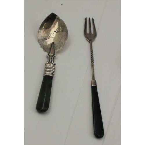 51 - A STERLING SILVER PICKLE FORK AND A SPOON, both with polished green stone (possibly jade) handles, t... 