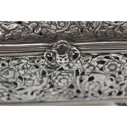 53 - A DUTCH SILVER TABLE CASKET, domed hinged cover, cast, pierced design with birds and flowers, a mask... 