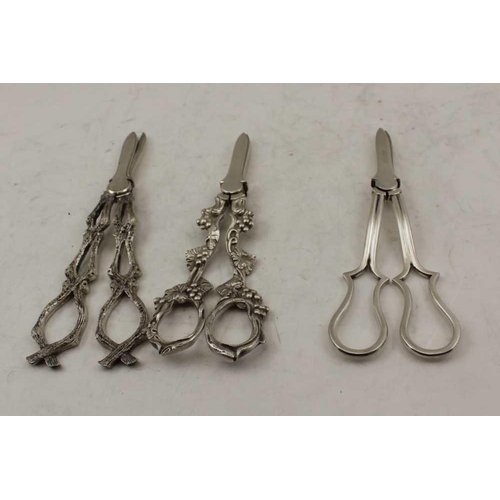 63 - THREE PAIRS OF EARLY 20TH CENTURY SILVER PLATED GRAPE SCISSORS, one pair cast fruiting vine design (... 