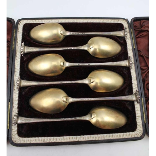 70 - THOMAS CHAWNER A SET OF SIX GEORGE III SILVER TABLE SPOONS, Onslow pattern, with gilded bowls, Londo... 