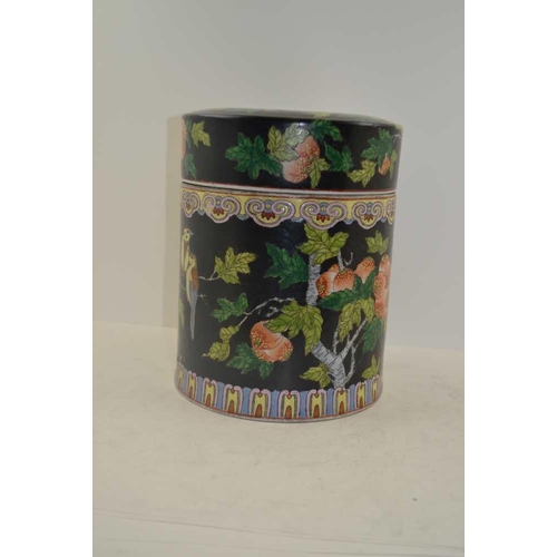 92 - A 20th CENTURY CHINESE CYLINDRICAL POT and cover, large size, decorated with birds and flowers in th... 