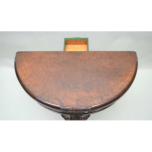 284 - A GEORGIAN DESIGN WALNUT VENEER BOW FRONT FOLDOVER CARD TABLE, raised on carved cabriole supports ... 