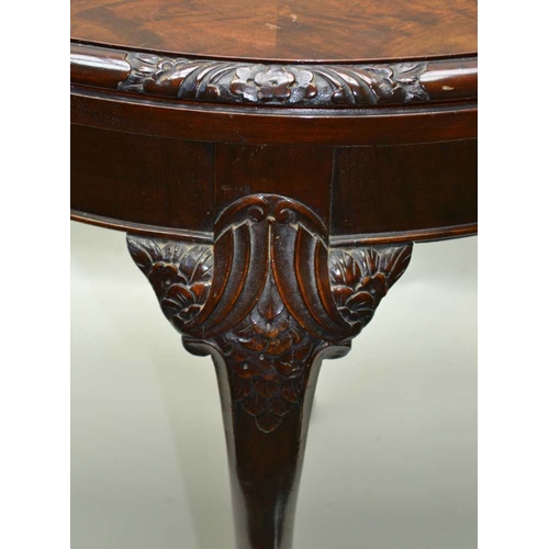 284 - A GEORGIAN DESIGN WALNUT VENEER BOW FRONT FOLDOVER CARD TABLE, raised on carved cabriole supports ... 