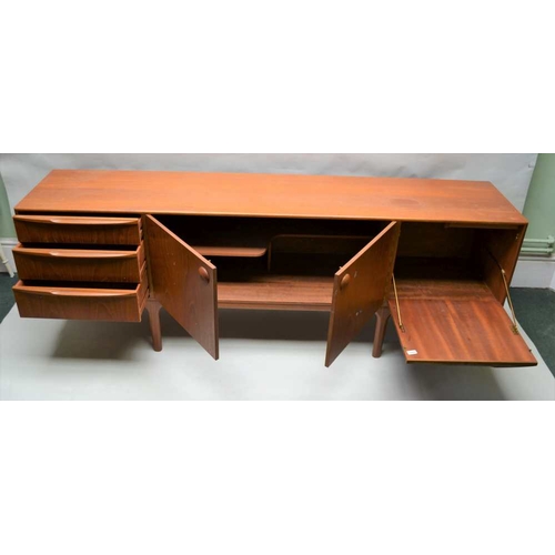 317 - A McINTOSH BRANDED TEAK LONG AND LOW SIDEBOARD, having a combination of cupboard doors, drawers and ... 