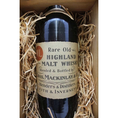 A WOODEN CASED BOTTLE OF MACKINLAY'S RARE OLD HIGHLAND MALT A WOODEN CASED BOTTLE OF MACKINLAY'S RARE OLD HIGHLAND MALT