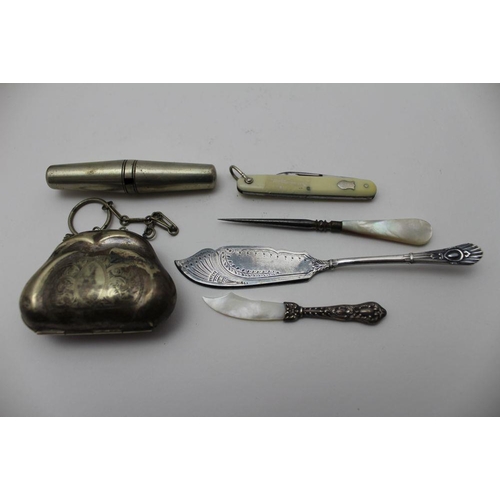 16 - A selection of wares including a scimitar form paper knife, with mother-of-pearl blade and sterling ... 