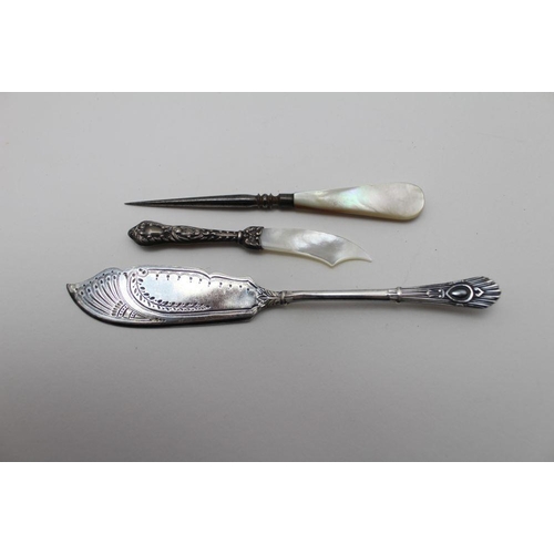 16 - A selection of wares including a scimitar form paper knife, with mother-of-pearl blade and sterling ... 