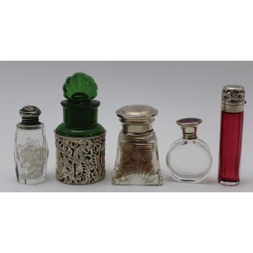 21 - Henry Williamson Ltd. a glass scent bottle with silver and purple guilloche enamel screw cap, London... 