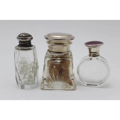 21 - Henry Williamson Ltd. a glass scent bottle with silver and purple guilloche enamel screw cap, London... 