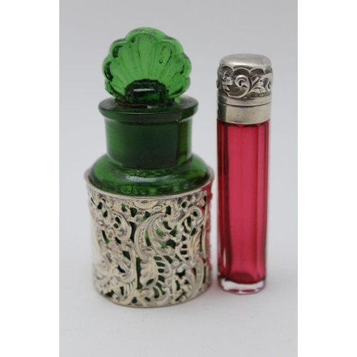 21 - Henry Williamson Ltd. a glass scent bottle with silver and purple guilloche enamel screw cap, London... 