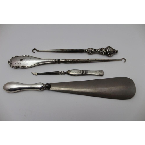 22 - A collection of various wares to include; six long handled South American mate spoons, each with a v... 